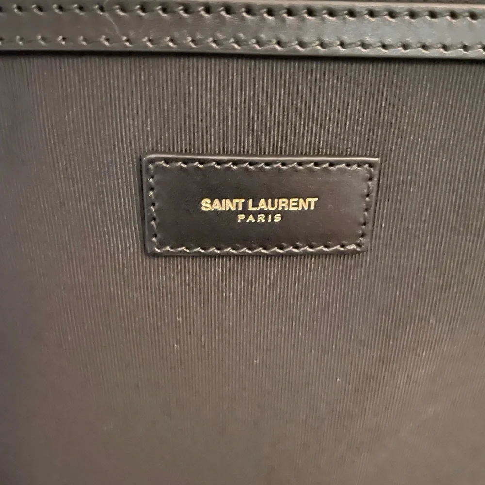YSL Saint Laurent paris travel luggage trolley 360 wheels travel in style Italy